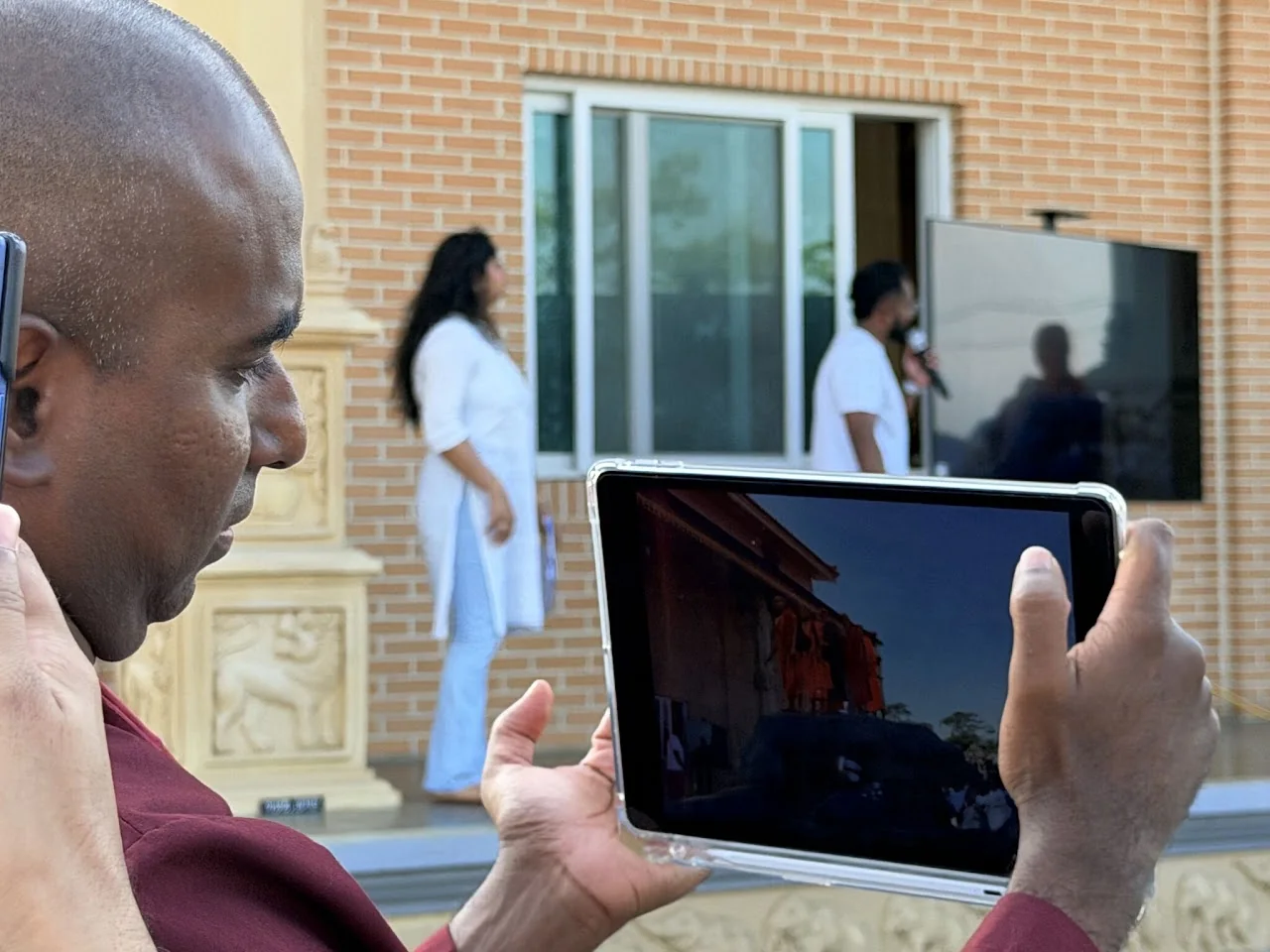 A visitor experiencing Digital Mihinthalaya on a tablet